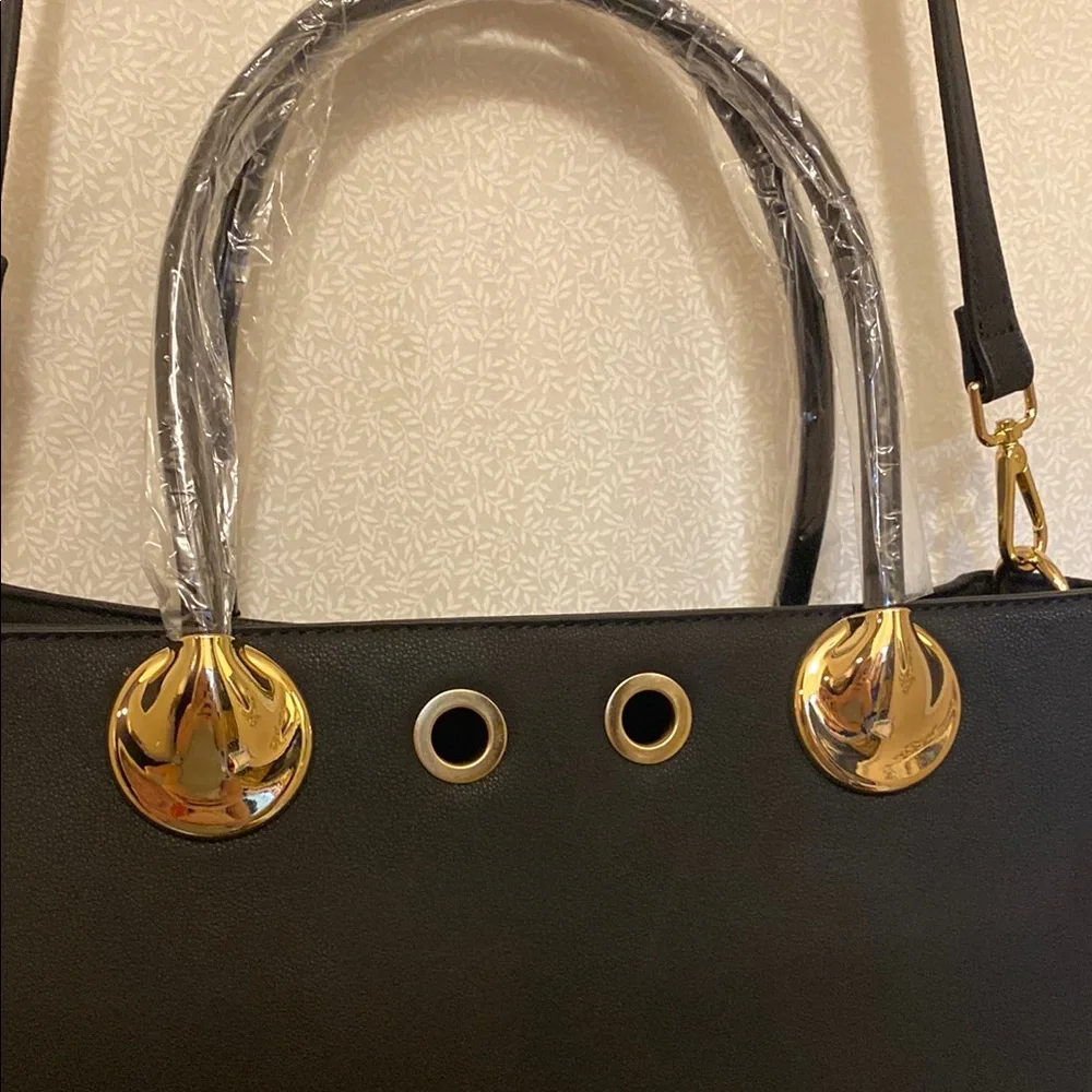 Elegant Black Handbag with Gold Accents